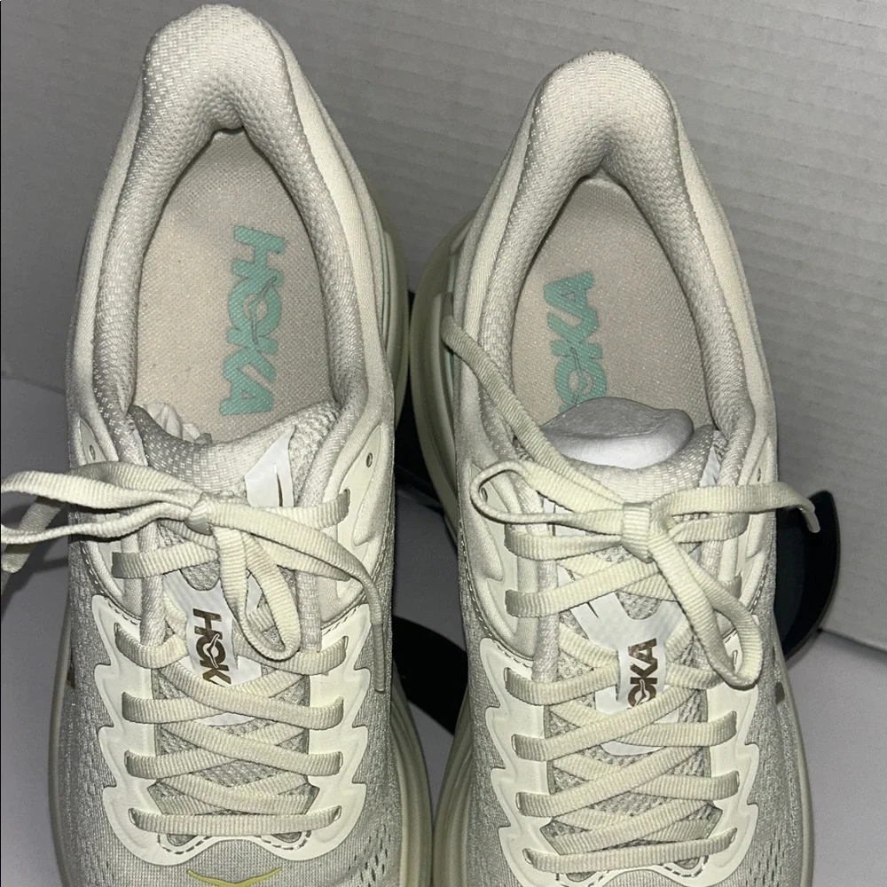 Hoka Off-White and Light Green Athletic Shoes